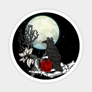 black raven in skeleton hand with a rose in front of a full moon Magnet